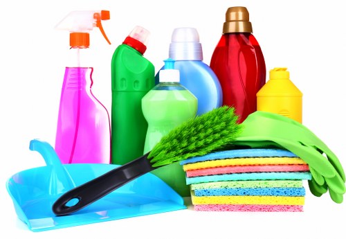 Deep cleaning in a bright modern living room