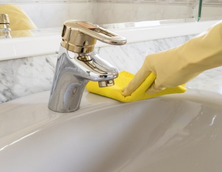 Kitchen domestic cleaning with sparkling counters and organized tools